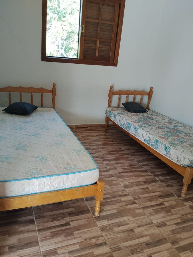 Suíte 4 do Recanto dos Canários — acomoda grupos de até 15 hóspedes em chácara de temporada, Paraibuna SP